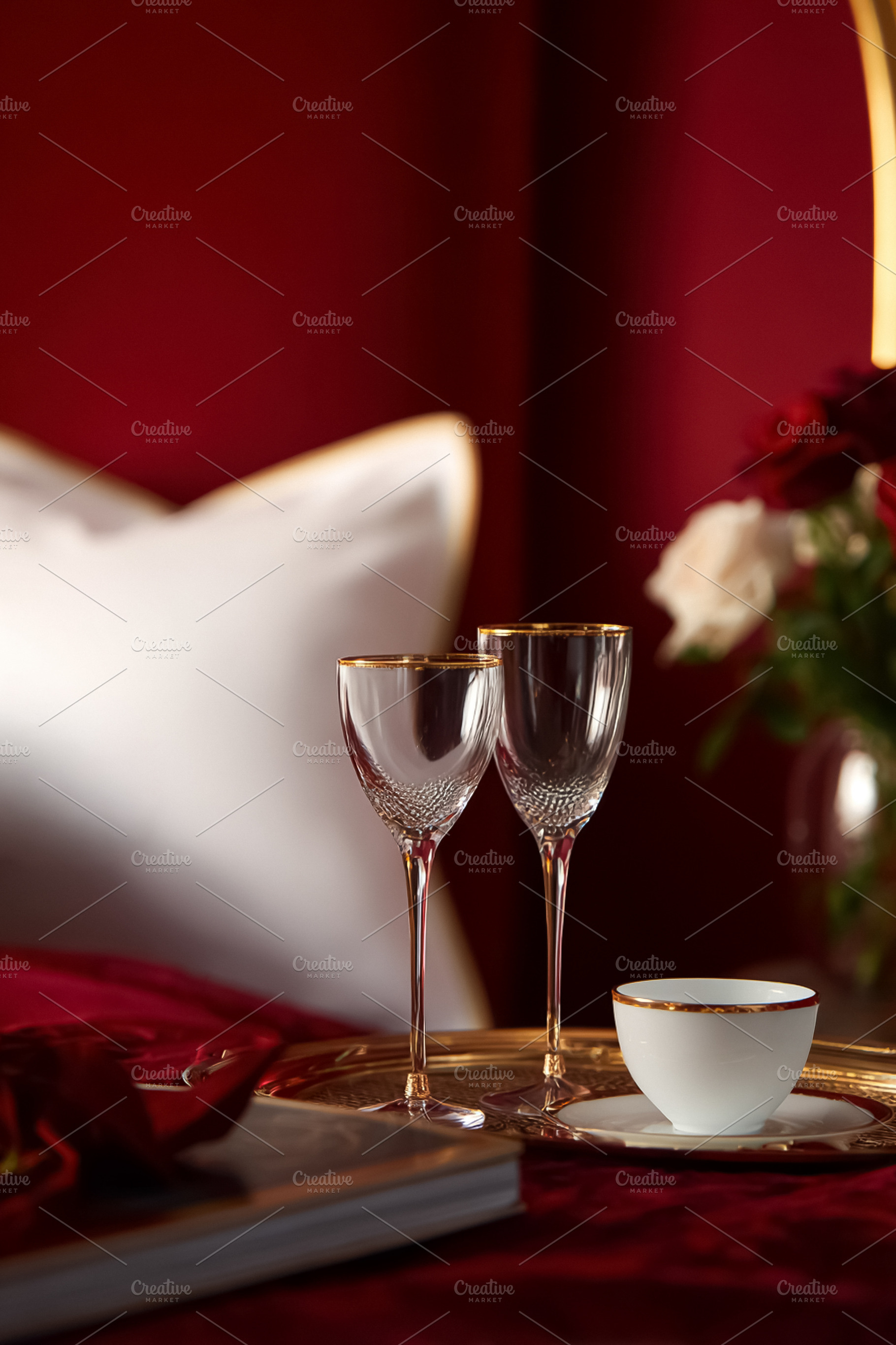 Romantic Valentine's Day setting with elegant wine glasses, a co, a Photo by Studio ANNA