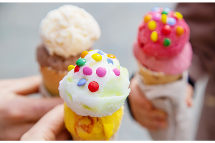 Ice cream in the hands of people, a Food & Drink Photo by yanadjana