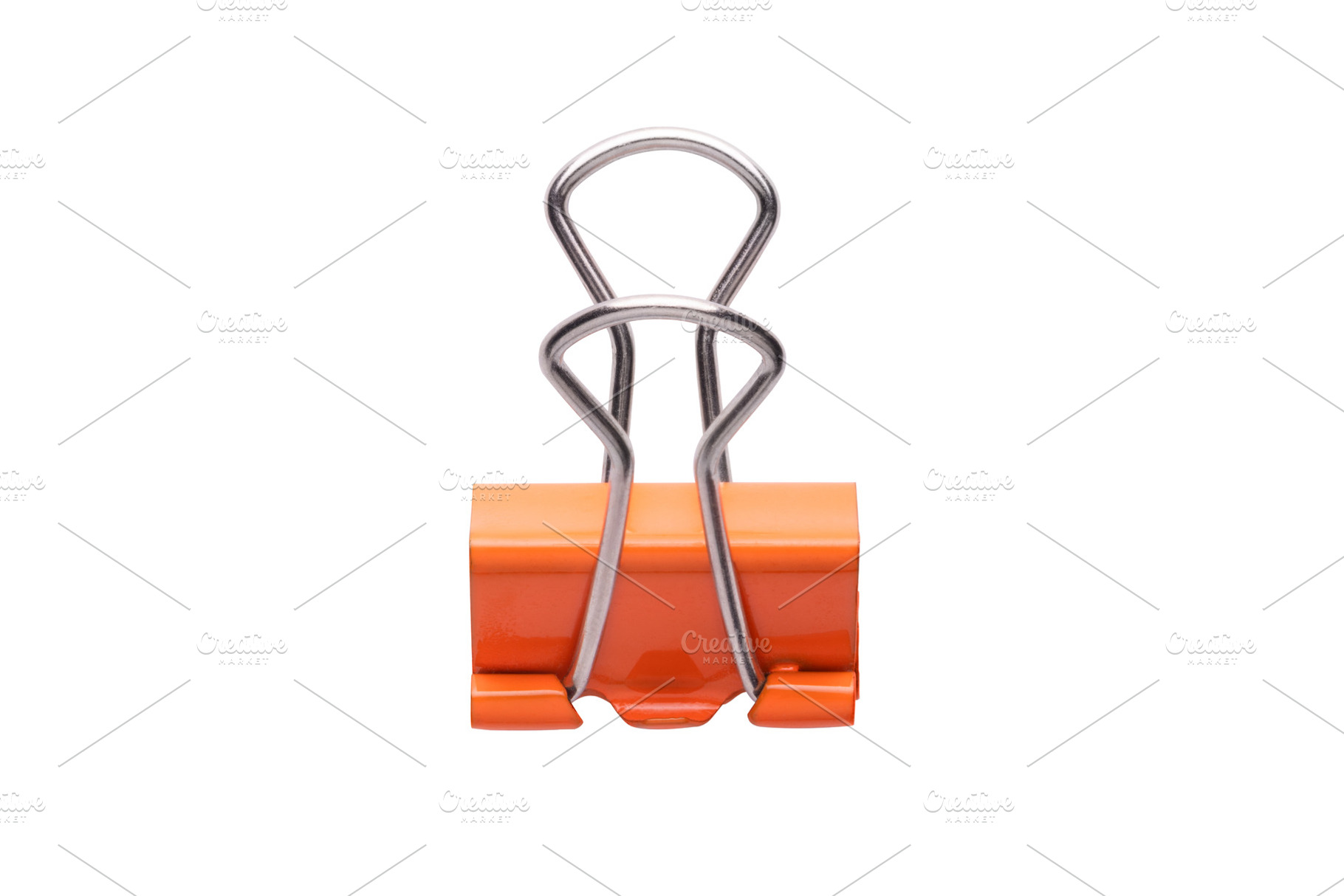 Orange binder paper clip isolated on white background. Minimalis, a Business Photo by Ales Munt