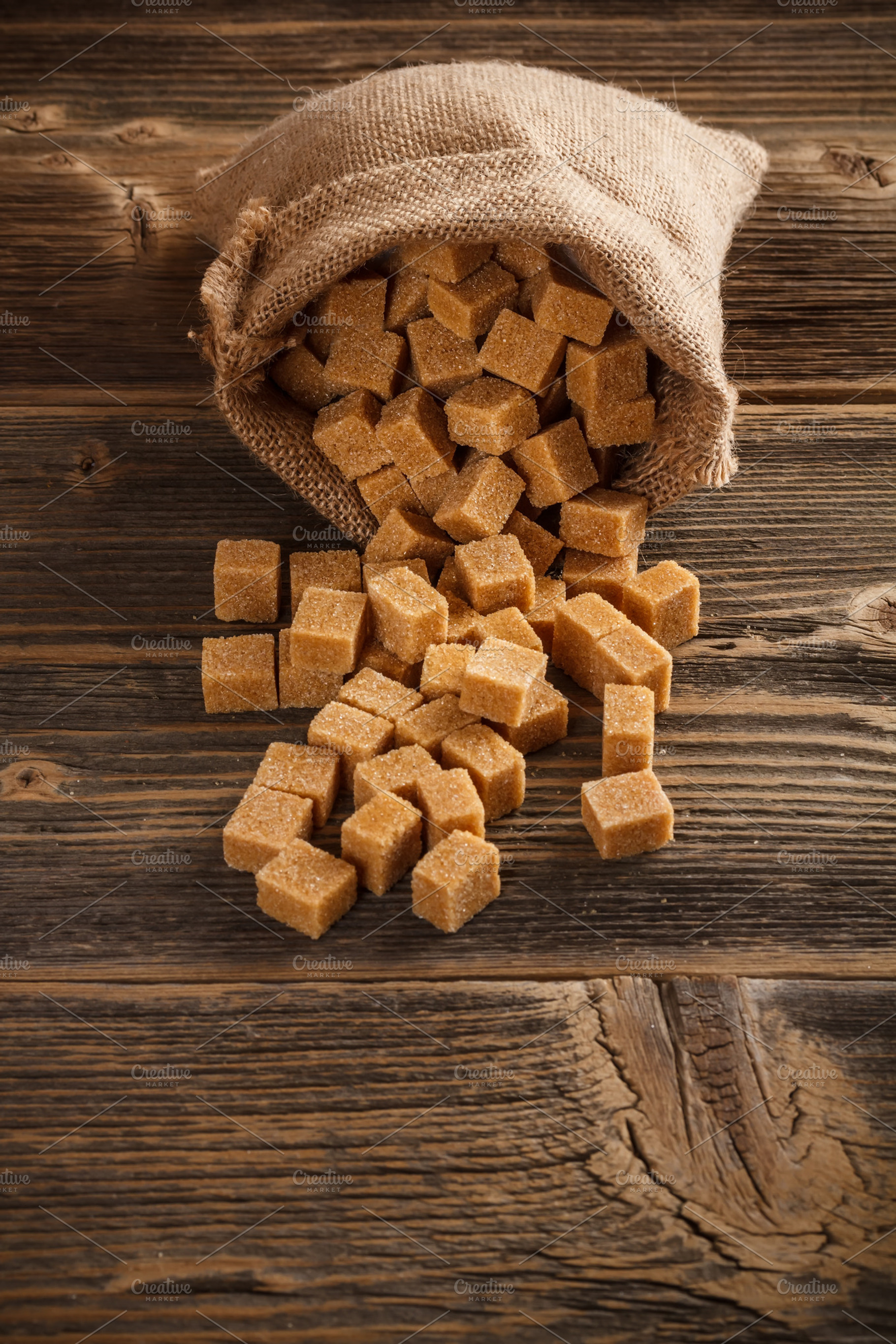 Brown sugar cubes stock photo containing background and bag
