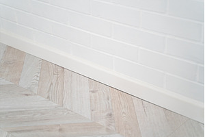 Corner view of white brick wall and, a Background Photo by volodymyrshtun13795