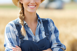 Smiling young female farmer in straw, a Person Photo by MistyDay
