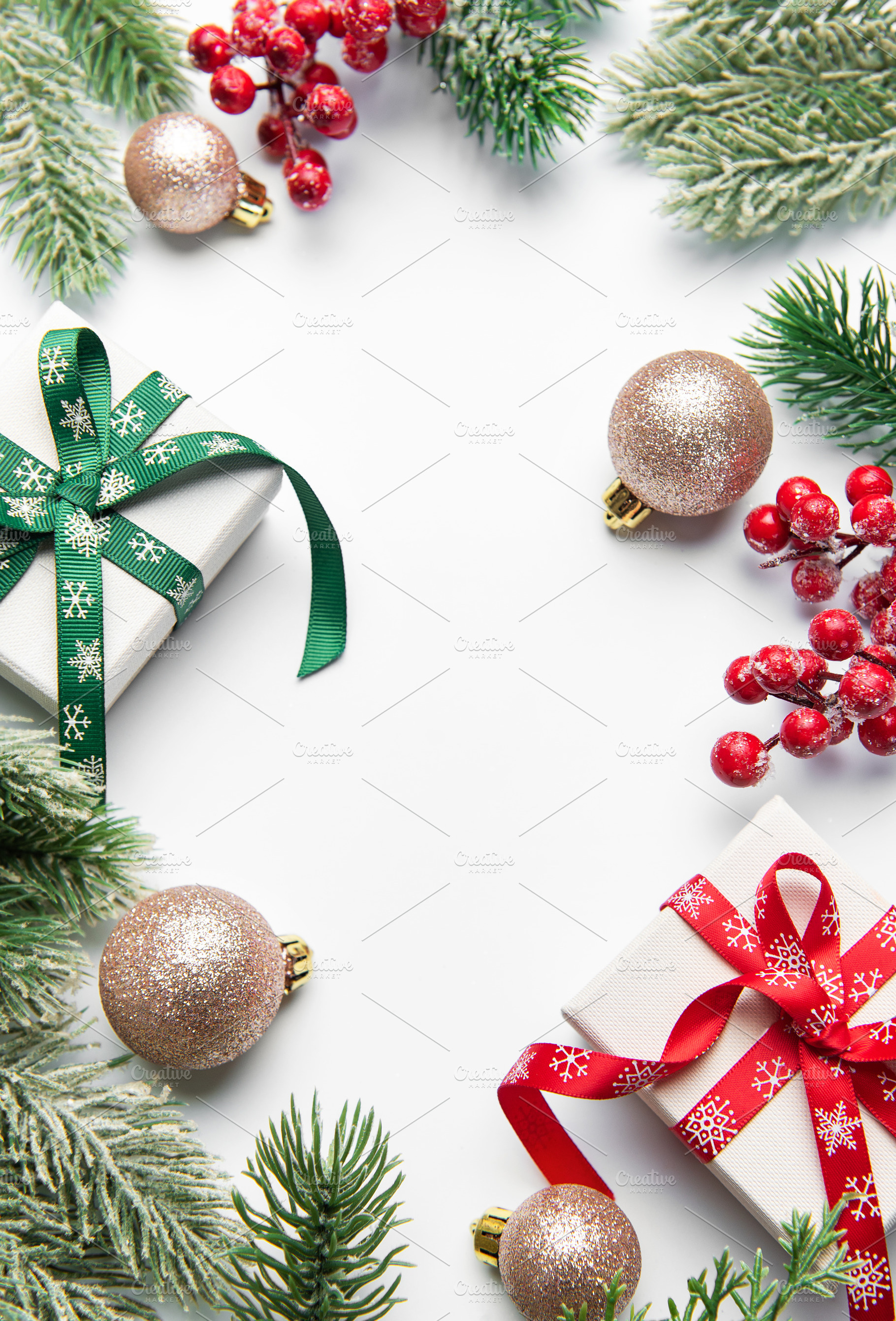 Christmas gifts and decorations forming a festive frame, a Holiday Photo by Olena Rudo