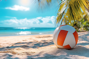 Volleyball on sandy beachfront with clear blue sky and palm tree, a Sports & Recreation Photo by AlyaAnd