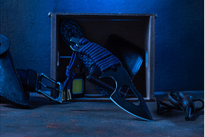 A knife with a fixed blade against, an Industrial Photo by Stockphoto by vzwer