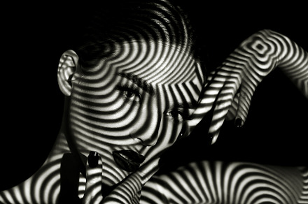 Shadow on the girl containing art, background, and beautiful, a Person Photo by Yurkova