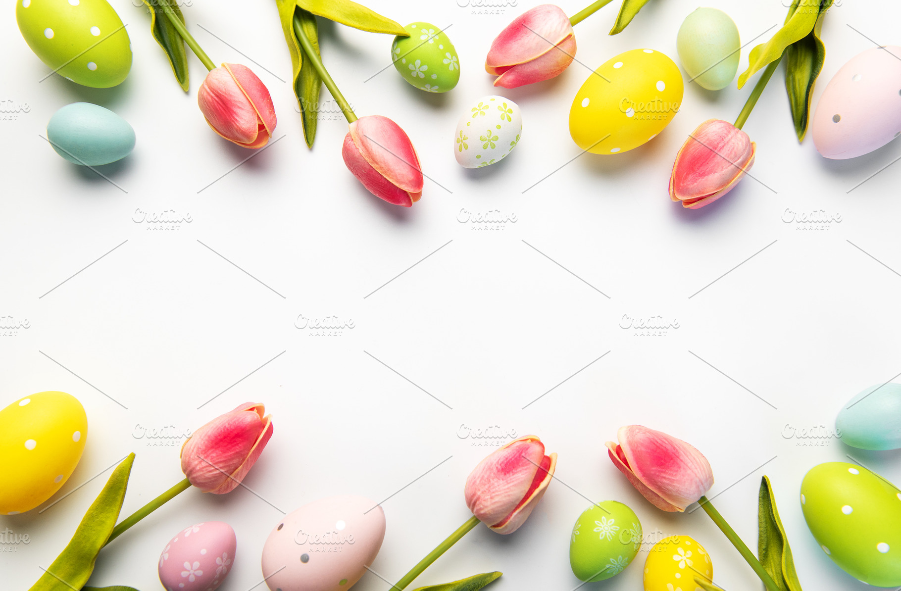 Easter eggs and tulips creating spring holiday frame, a Holiday Photo by Olena Rudo