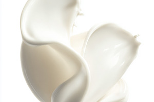 Milk splash creating a creamy liquid wave and abstract design, r, a Photo by Studio ANNA