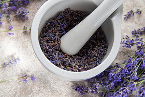 Lavender flowers and mortar with pestle for aromatherapy, a Health & Medical Photo by Olena Rudo