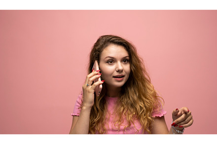 Surprised woman talking on phone, a Person Photo by volodymyrshtun13795
