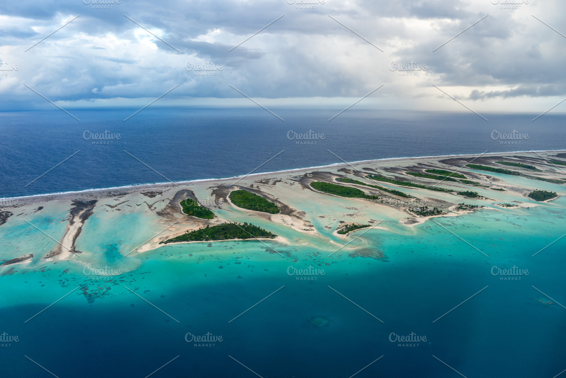 Aerial view of Rangiroa atoll, French Polynesia, with lagoon and, a Photo by GoodGoods