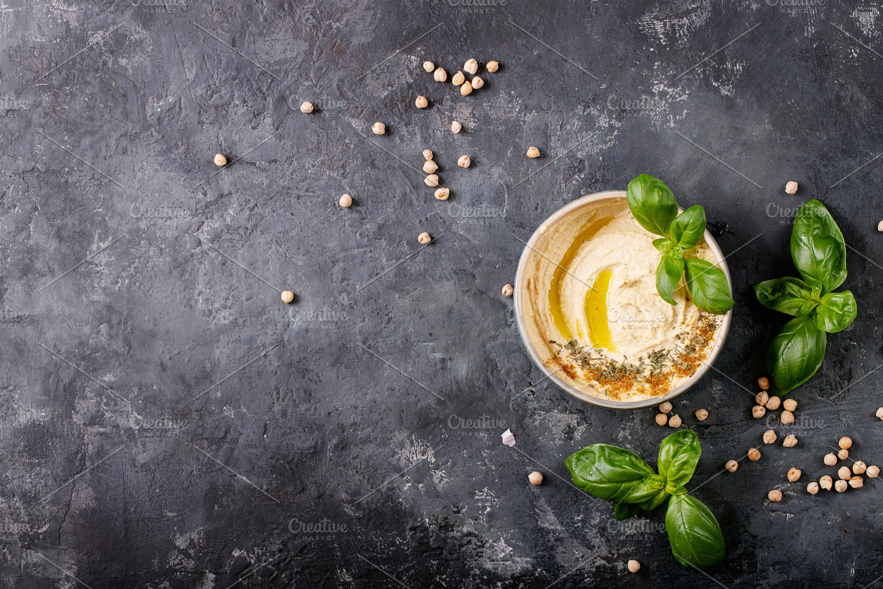 Hummus with olive oil and ground cumin, a Food & Drink Photo by RomanDebree