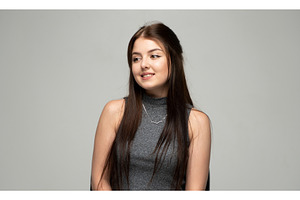 Young brunette woman looking away, a Person Photo by volodymyrshtun13795