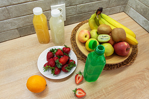 Fresh fruit and homemade juice preparing healthy snacks, a Food & Drink Photo by Olena Rudo