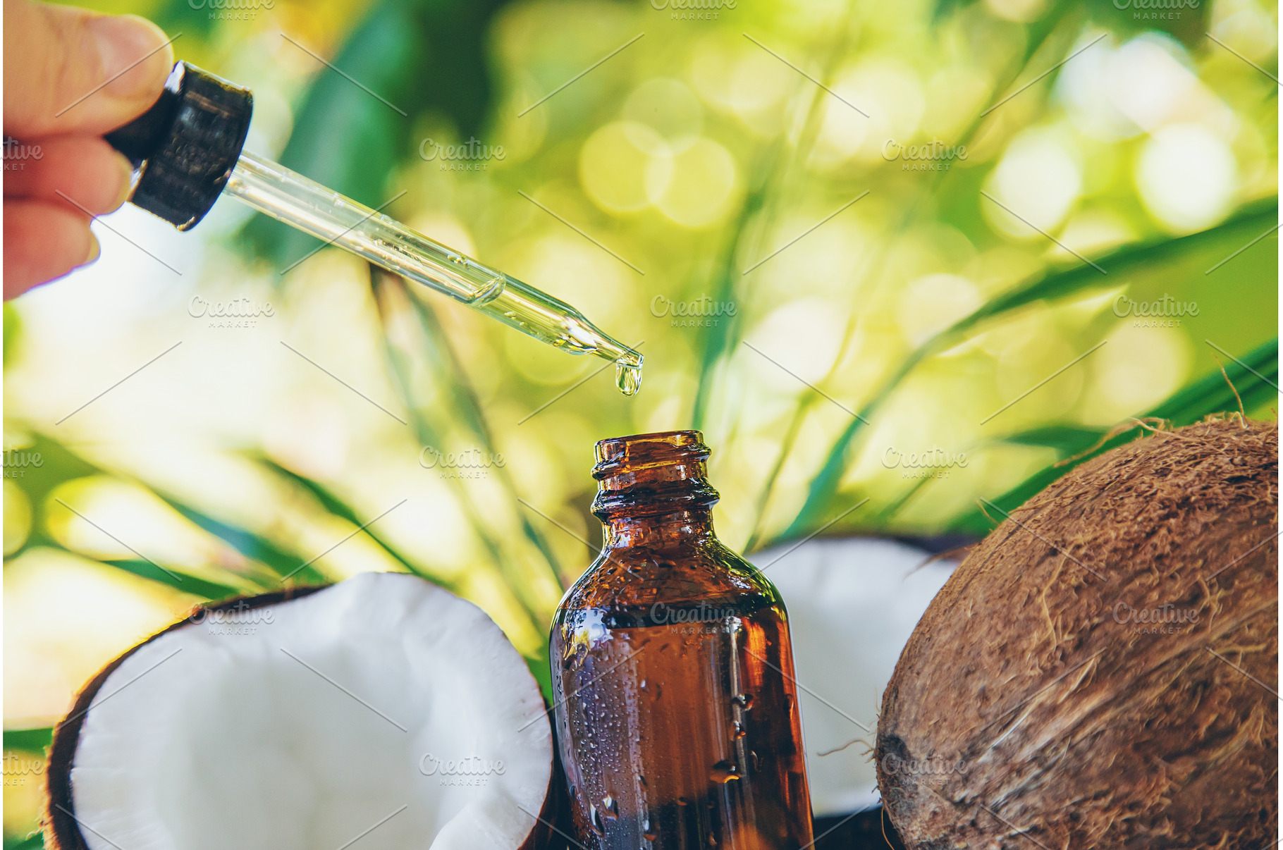 Natural coconut oil in a bottle, a Food & Drink Photo by yanadjana