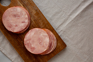 Organic Smoked Cold Cuts Deli Meat Ham on a wooden board, top vi, a Food & Drink Photo by LiudmylaChuhunova