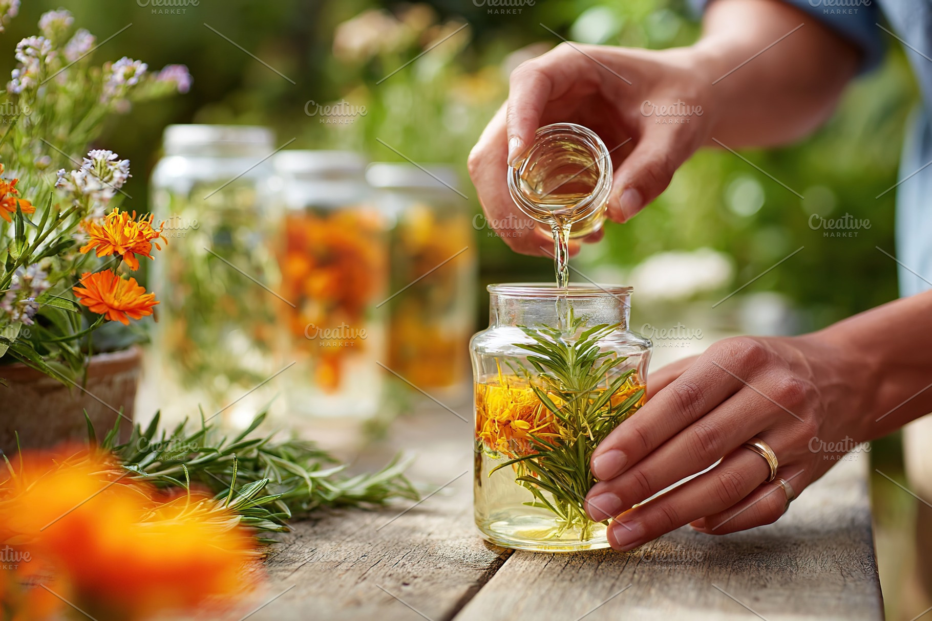 Homemade herbal infusion preparation in a sunny garden setting with fresh ingre, a Photo by AlyaAnd