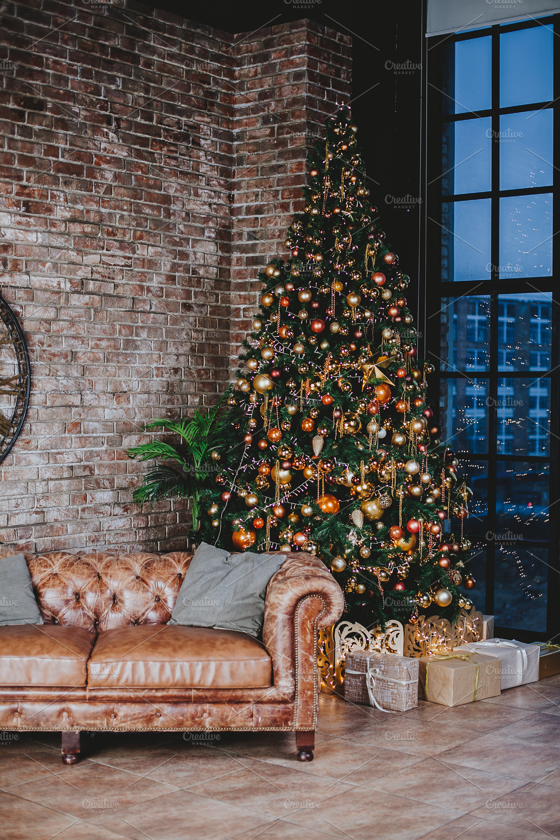 Interior with couch and decorated ch containing ball, bauble, and bead, a Holiday Photo by telnyaw