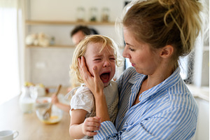 Little girl crying and screaming, a Health & Medical Photo by HalfPoint