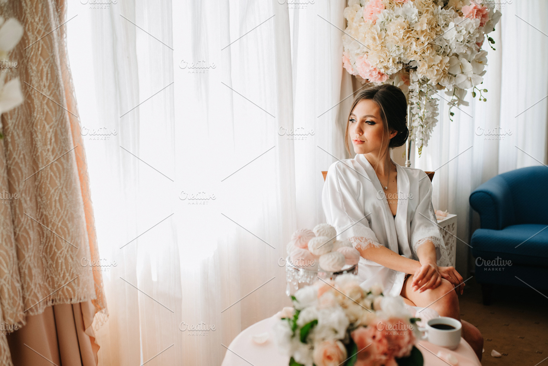 A young bride sits at a slot machine in the morning and drinks c, a Person Photo by Weddings, People, Travel