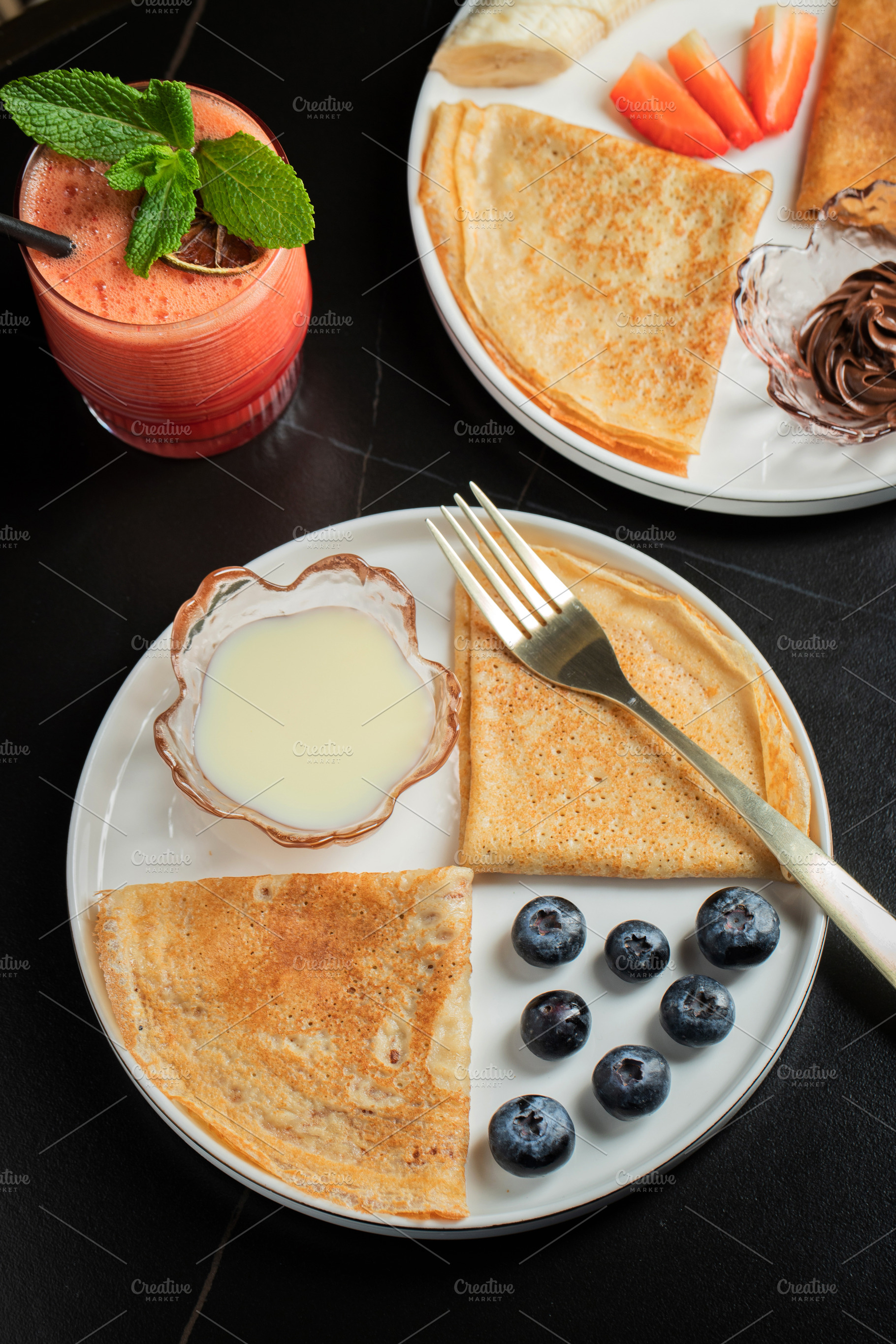 Pancakes with blueberry and honey on a white plate, a Food & Drink Photo by Budarinphoto