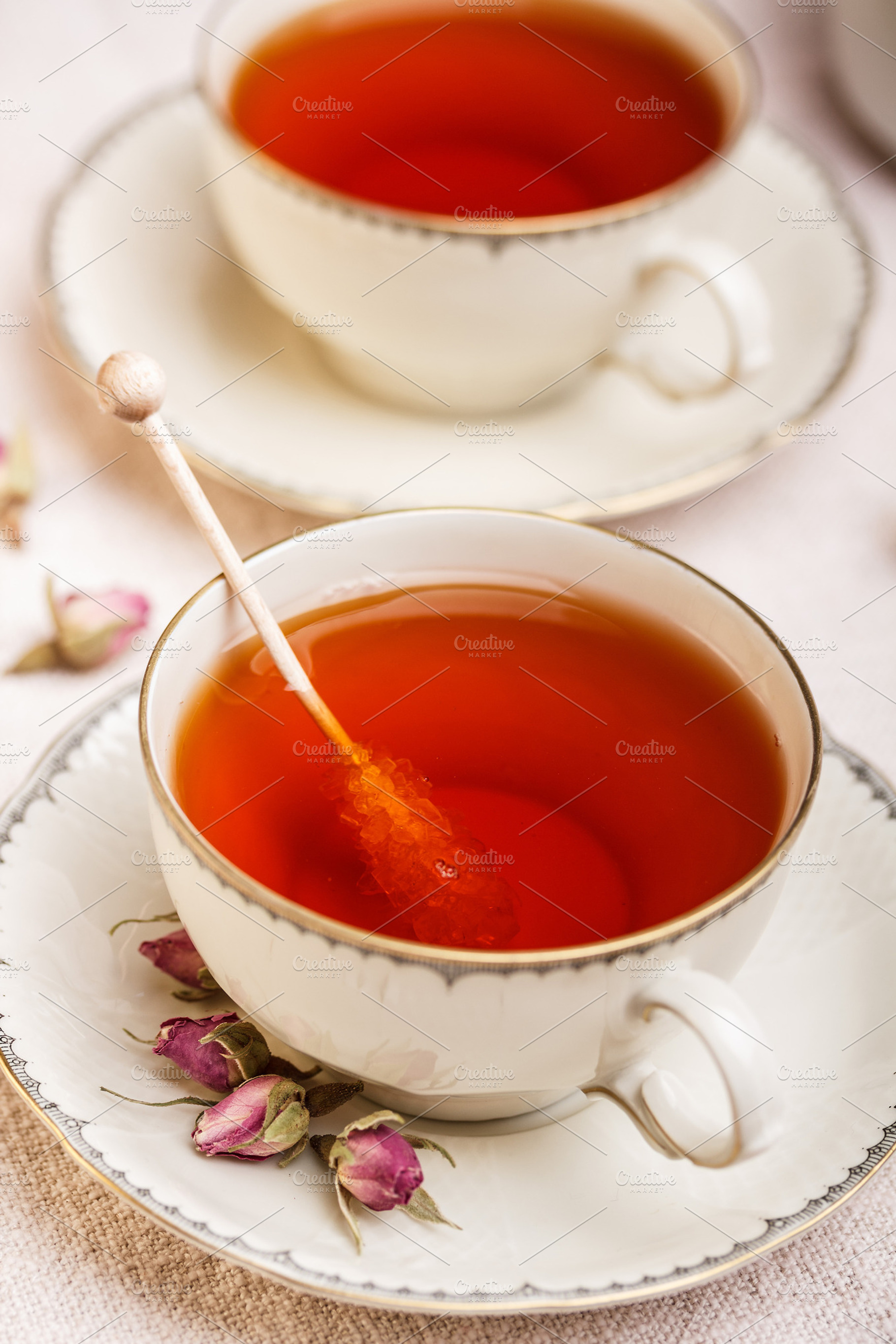 Cup of tea featuring tea, cup, and background