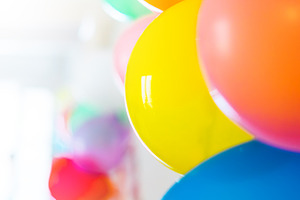 Multicolored balloons containing balloons, background, and birthday