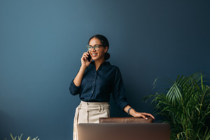 Smiling entrepreneur in formal wear, a Business Photo by Artem Varnitsin