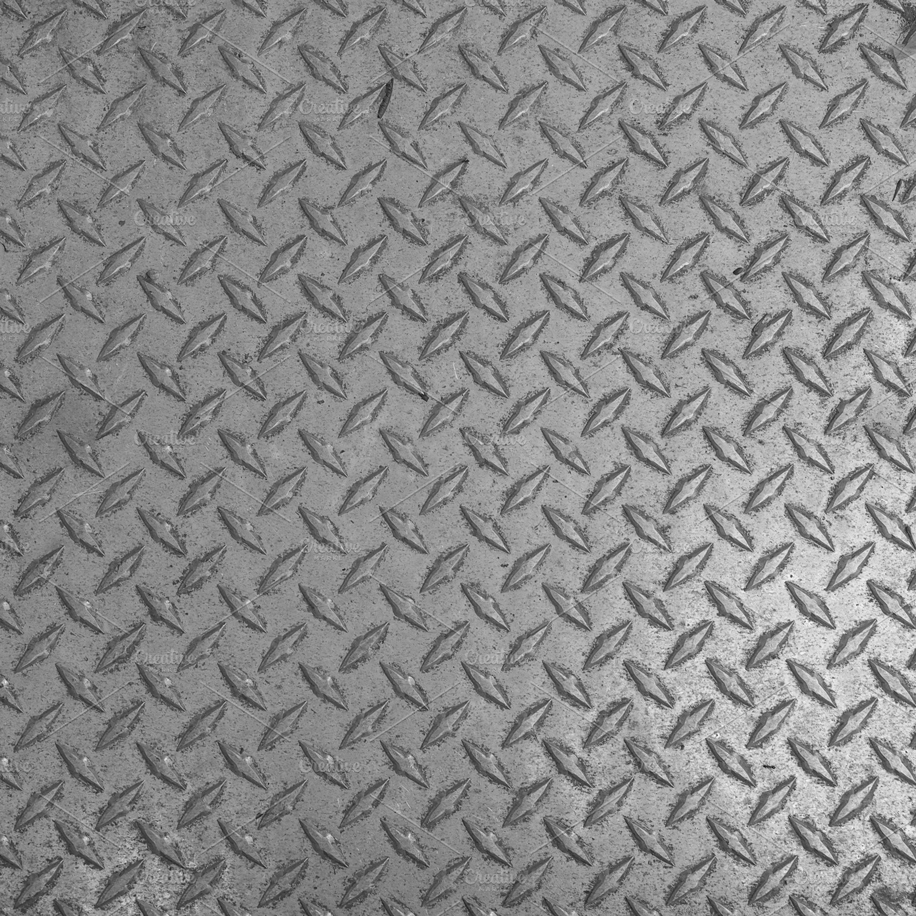 Grey steel diamond plate background, a Background Photo by WorldOfPhotos
