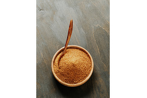 Bowl raw brown coconut sugar, a Food & Drink Photo by Fascinadora