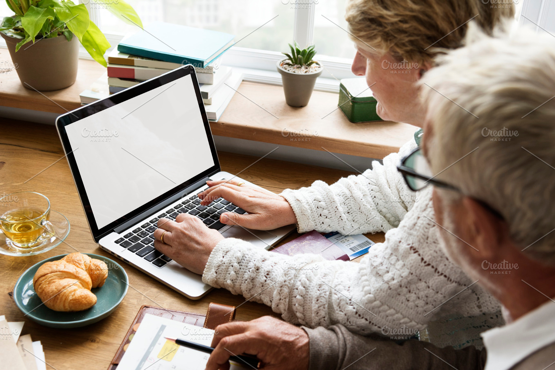 Elderly using computer laptop featuring blank, book, and break, a Person Photo by rawpixel