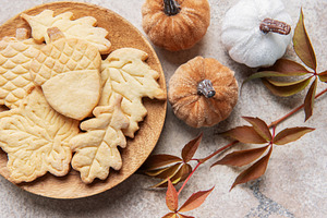 Autumn leaf and acorn cookies with festive pumpkins, a Food & Drink Photo by Olena Rudo