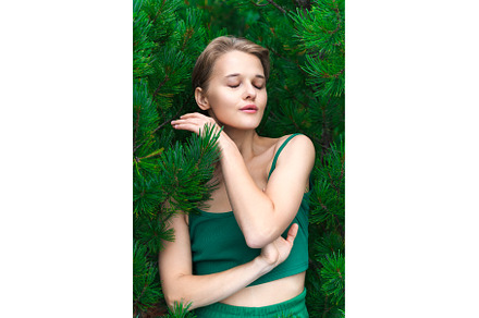 Blonde female with eyes closed