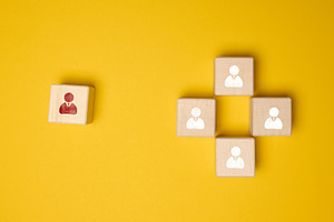 Wooden cubes with staff icons. Concepts of leadership, individua, a Business Photo by ndanko