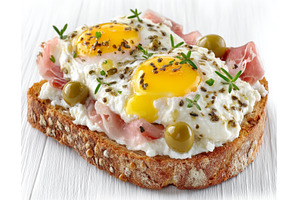 A sandwich with prosciutto, egg, a Food & Drink Photo by ZinetroN