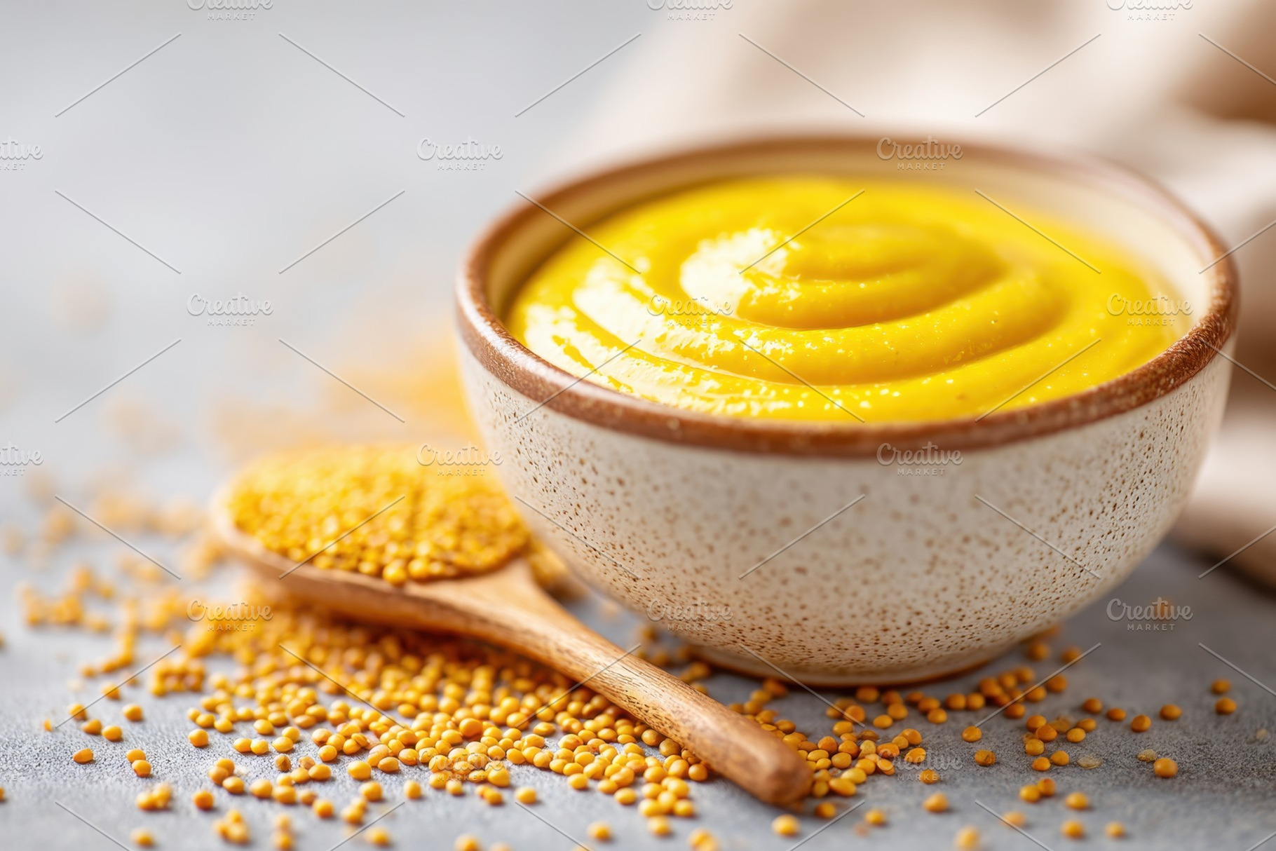 Bowl of smooth yellow mustard, a Food & Drink Photo by AlyaAnd