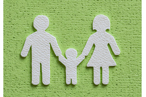 A family, including a father, mother, a Person Photo by ZinetroN