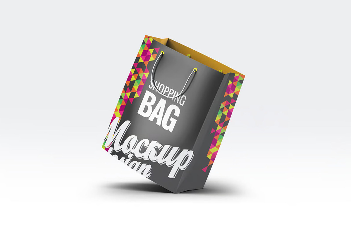 Paper Shopping Bag Mock-Up, a Packaging Mockup by DesignRushMarket (Photo 6 of 7)