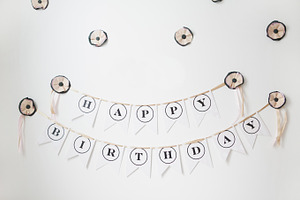 Pink and black garland of flags stock photo containing first birthday and 1