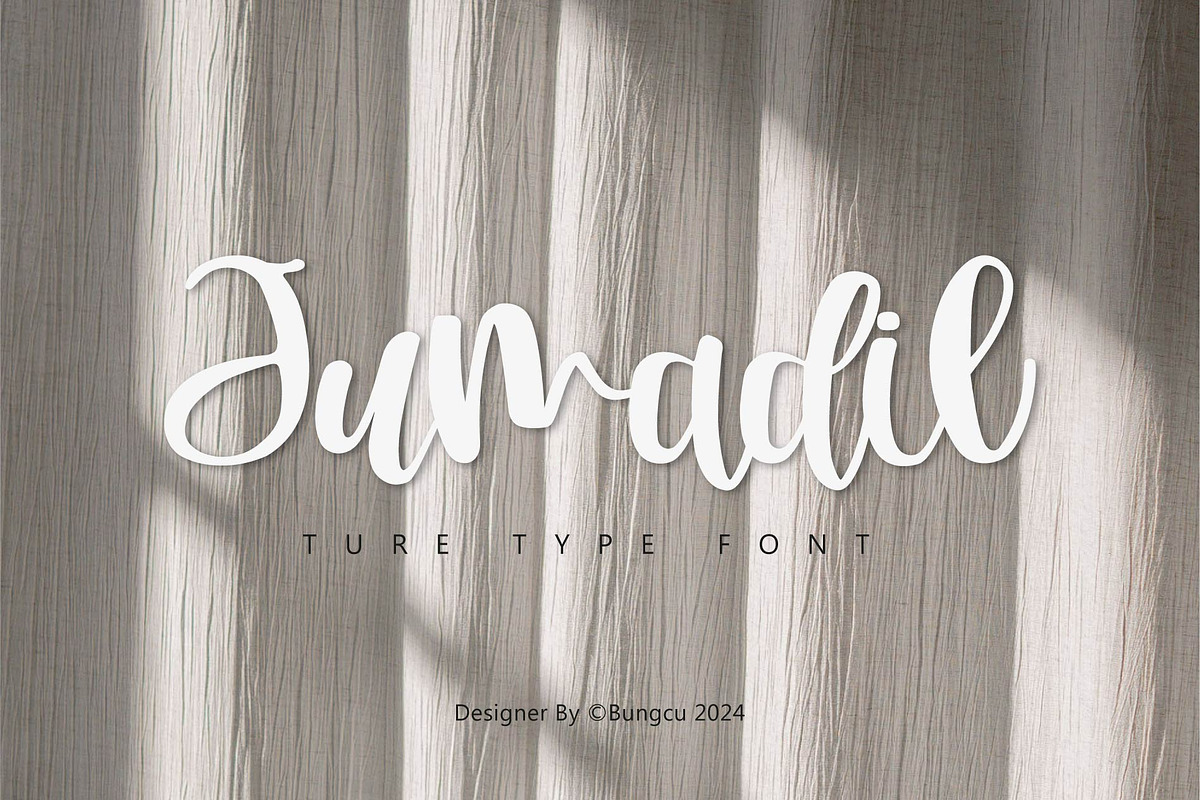 Jumadil, a Script Font by StudioRz (Photo 1 of 7)