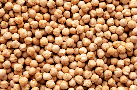 Dry Organic Chickpeas, top view. Flat lay. overhead, from above., a Food & Drink Photo by LiudmylaChuhunova