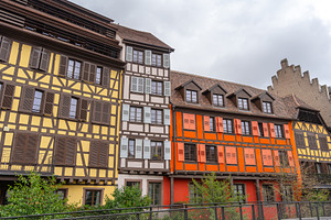 Facades of colorful half-timbered houses in Strasbourg, France, an Architecture Photo by GoodGoods
