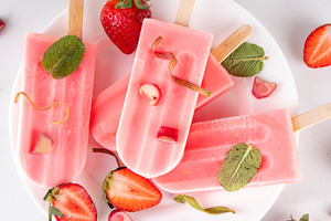 Strawberry Rhubarb ice cream popsicles, a Food & Drink Photo by Rimma