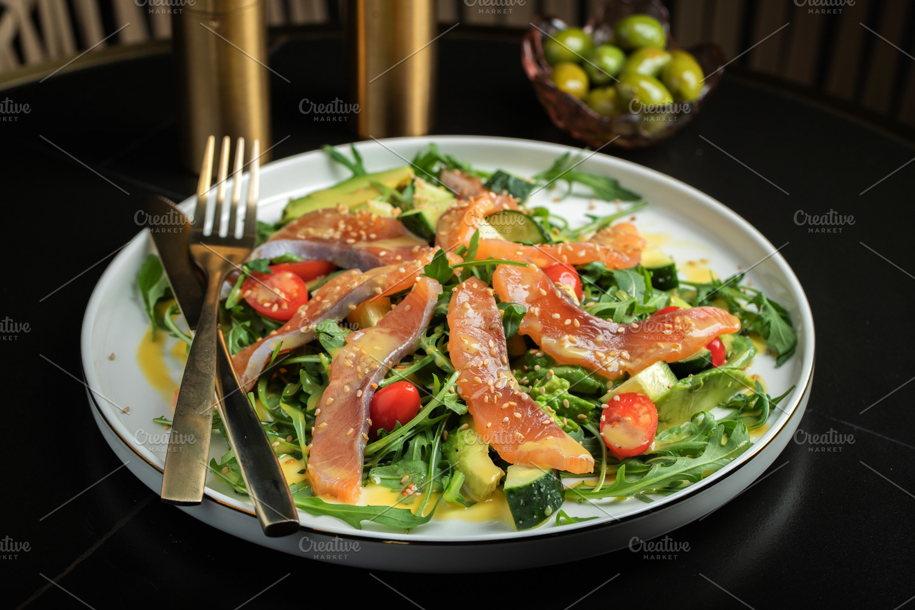Salad with salted salmon and arugula, a Food & Drink Photo by Budarinphoto