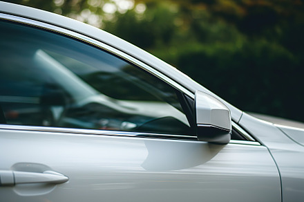 Closeup photo of a new white modern car, a Transportation Photo by AlyaAnd