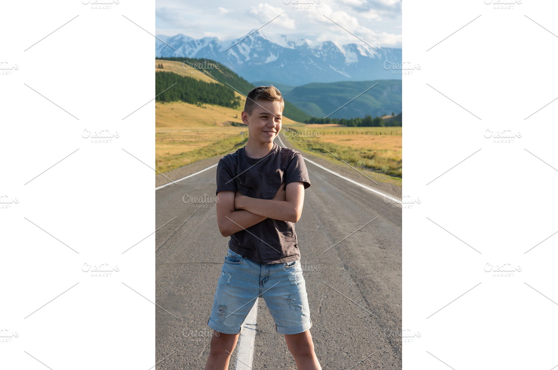 Smiling teen boy on the road in, a Person Photo by Jan Jack Russo Media