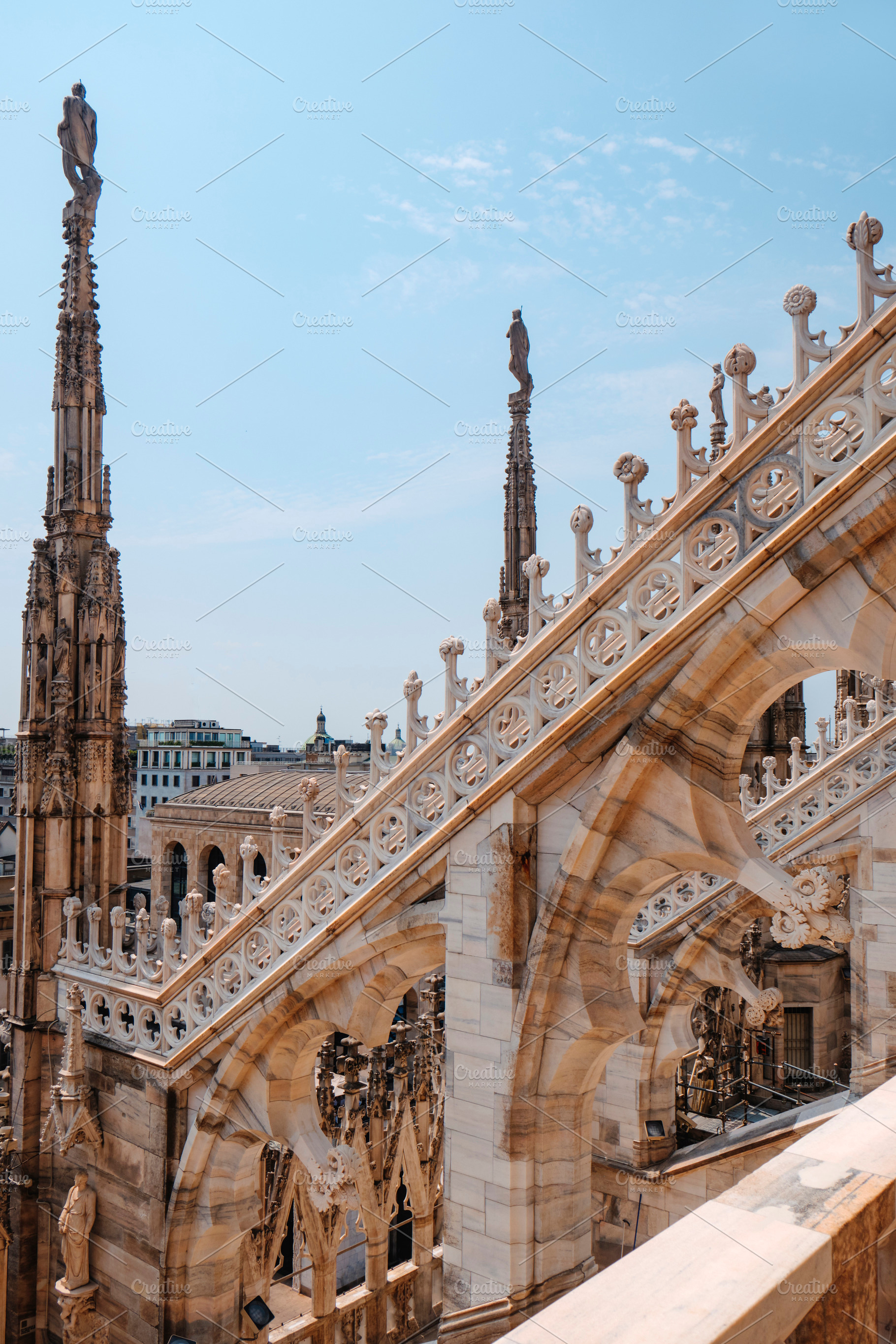 detail of marble buttresses in Milan Cathedral, a Photo by Nito
