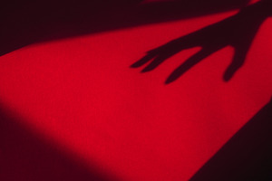 nightmare. hand reaches out to scare