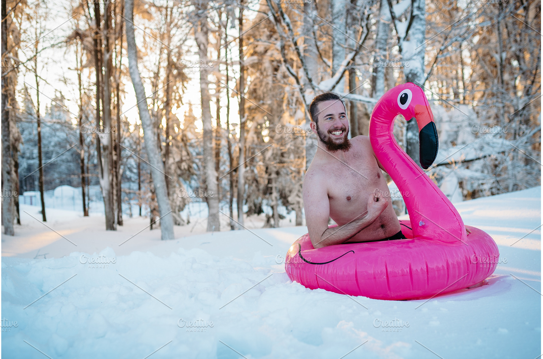 Naked man in snow, enjoying winter, a Person Photo by HalfPoint