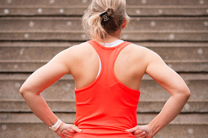 Fitness woman resting and looking at stairs before workout outdoor, a Person Photo by etorres69